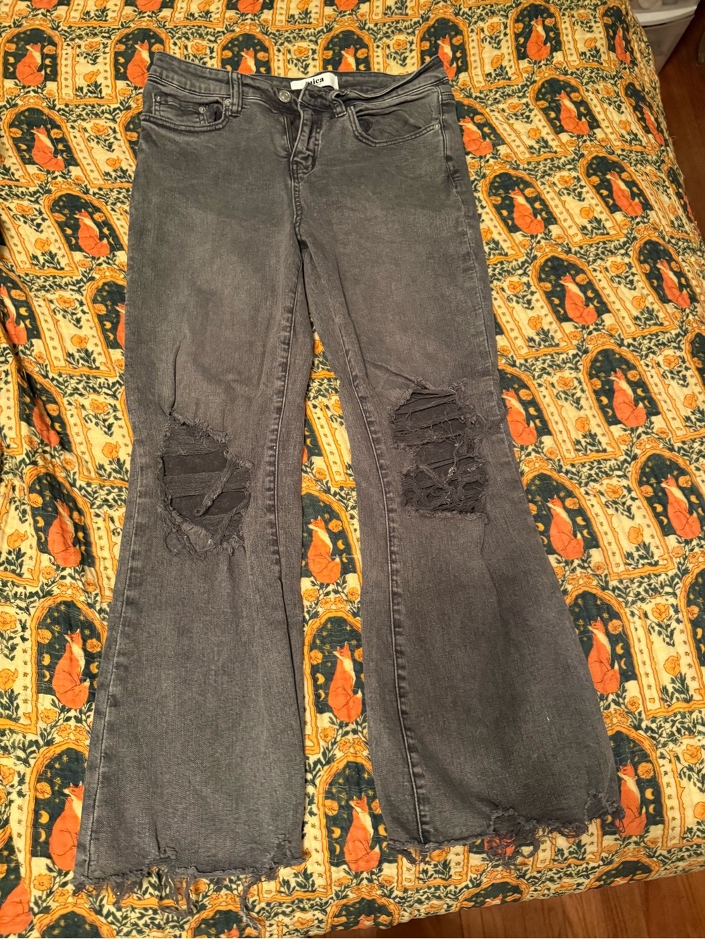 Black Distressed Flare Jeans with Knee Rips